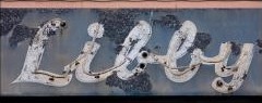 The weathered Libby hotel sign
